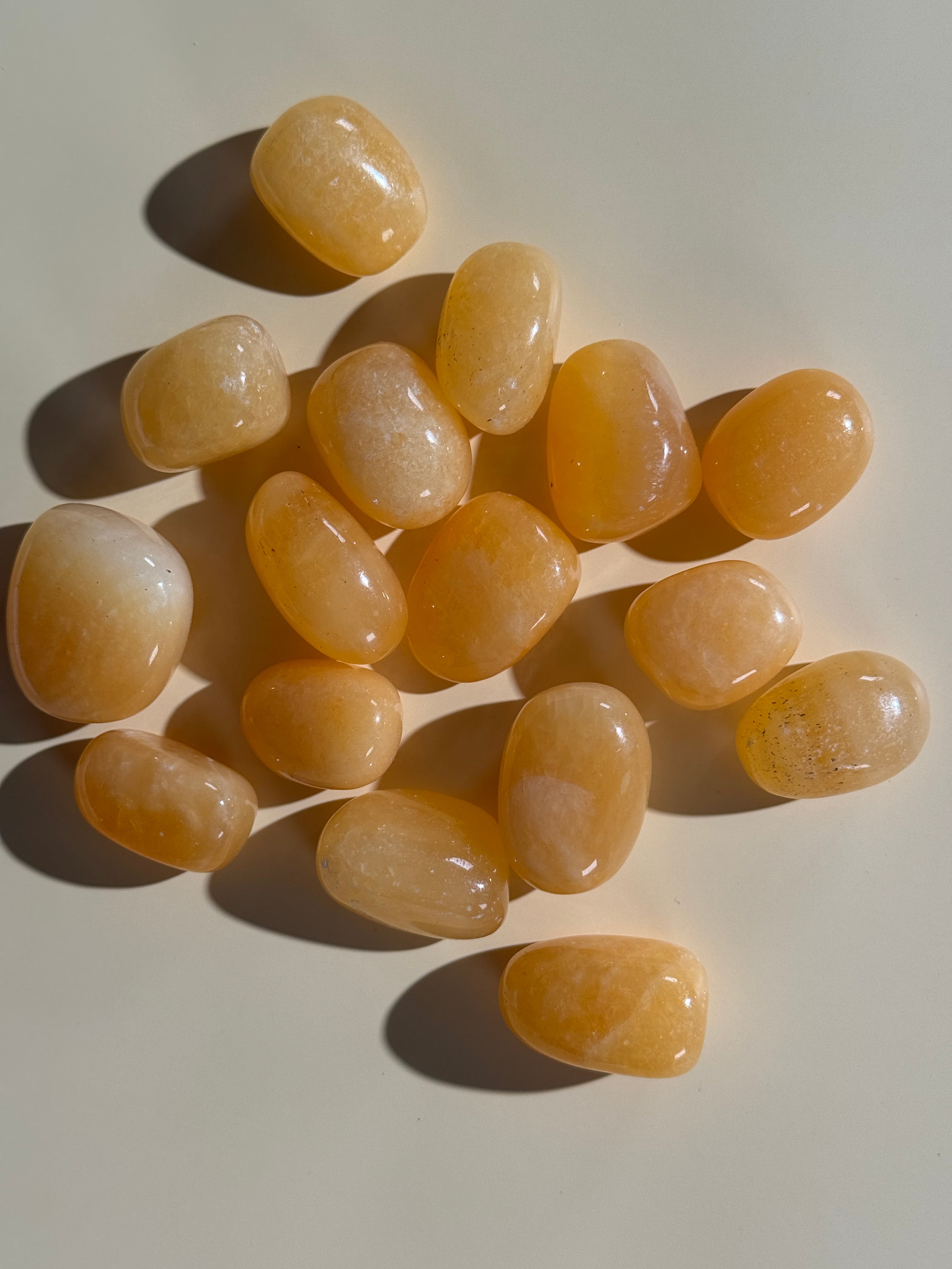 Orangen Calcit Trommelstein