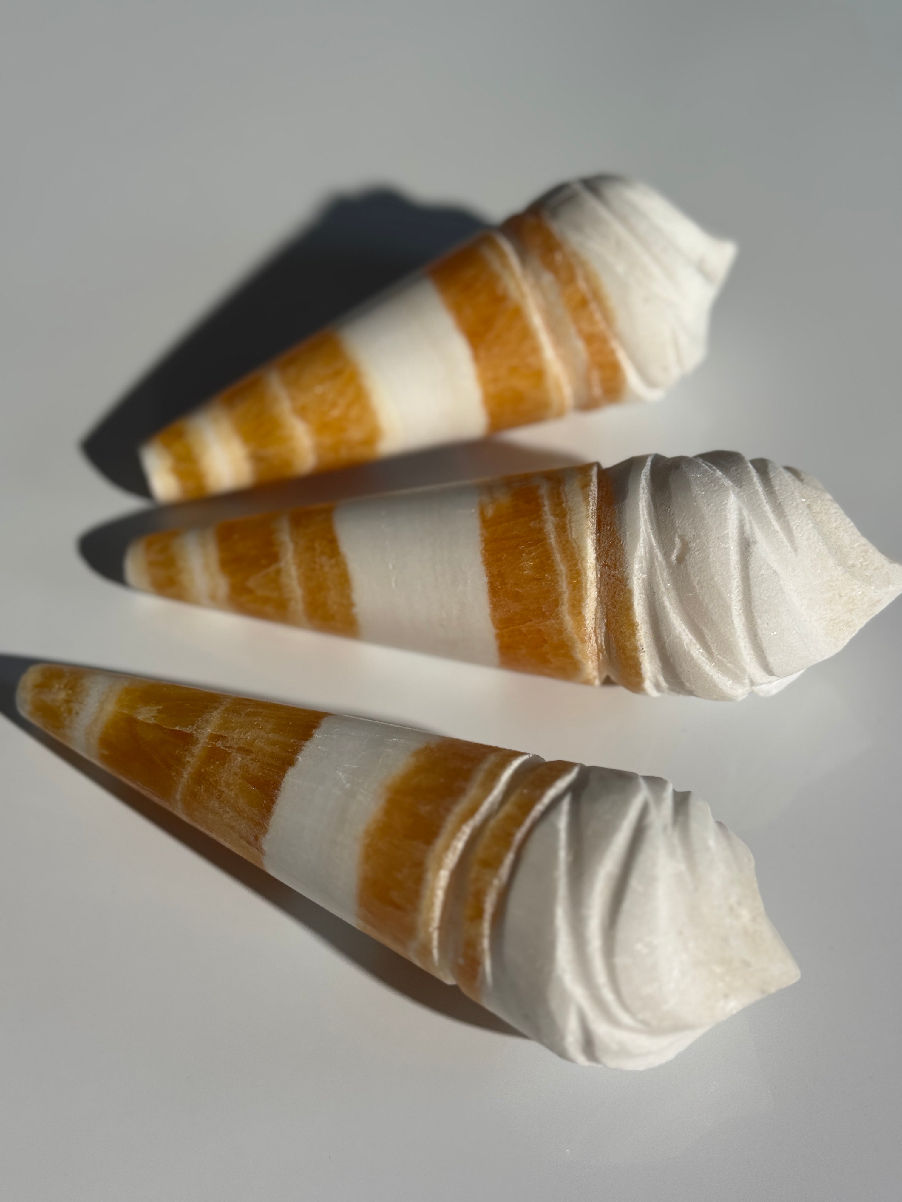 Orangencalcit Eis