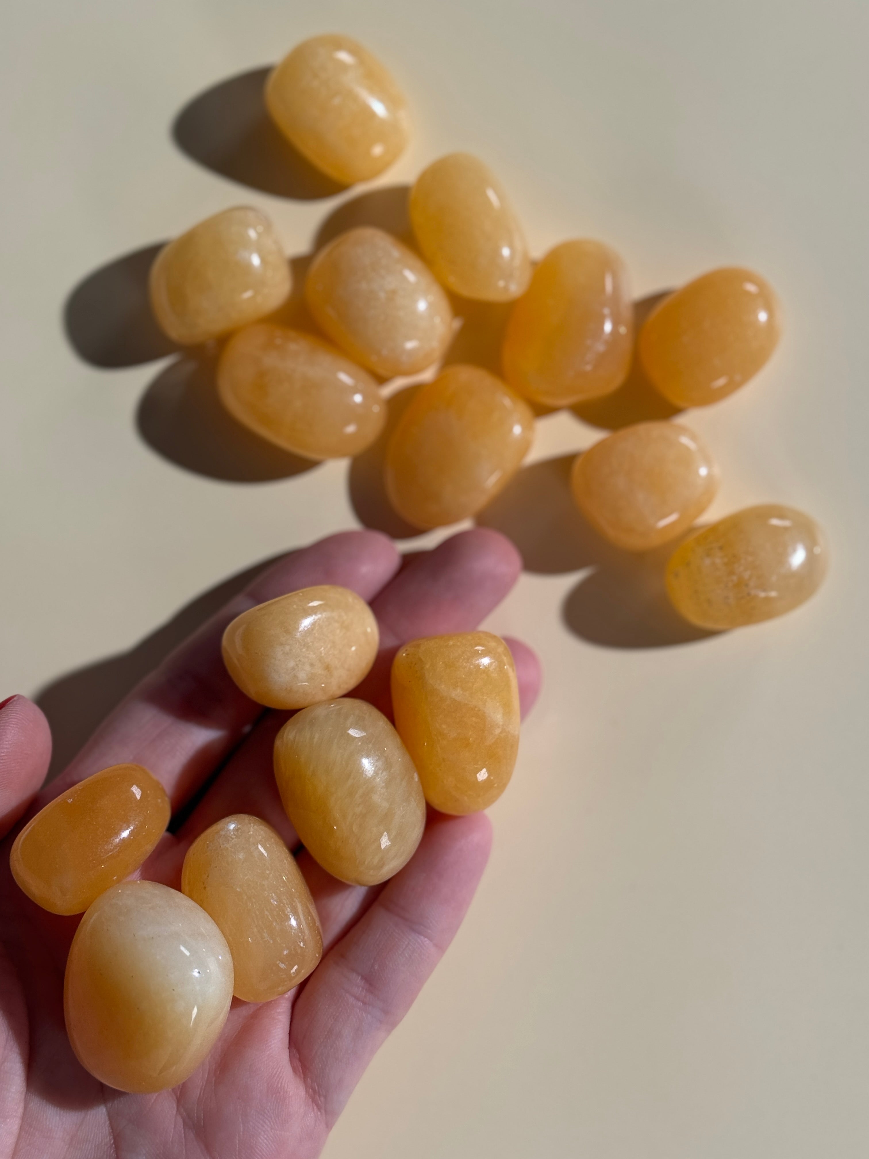 Orangen Calcit Trommelstein