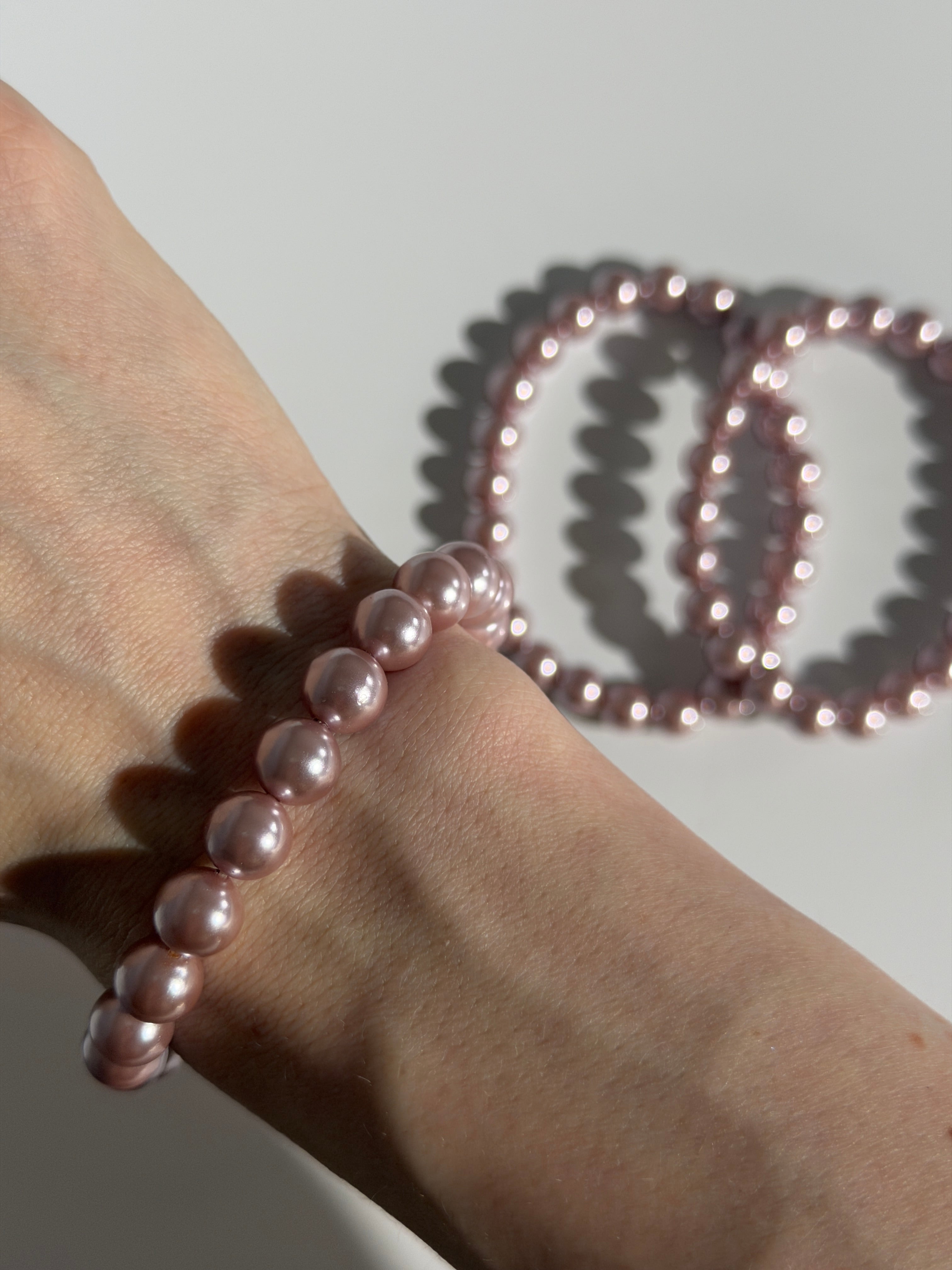 Muschelkern Violett Kugelarmband